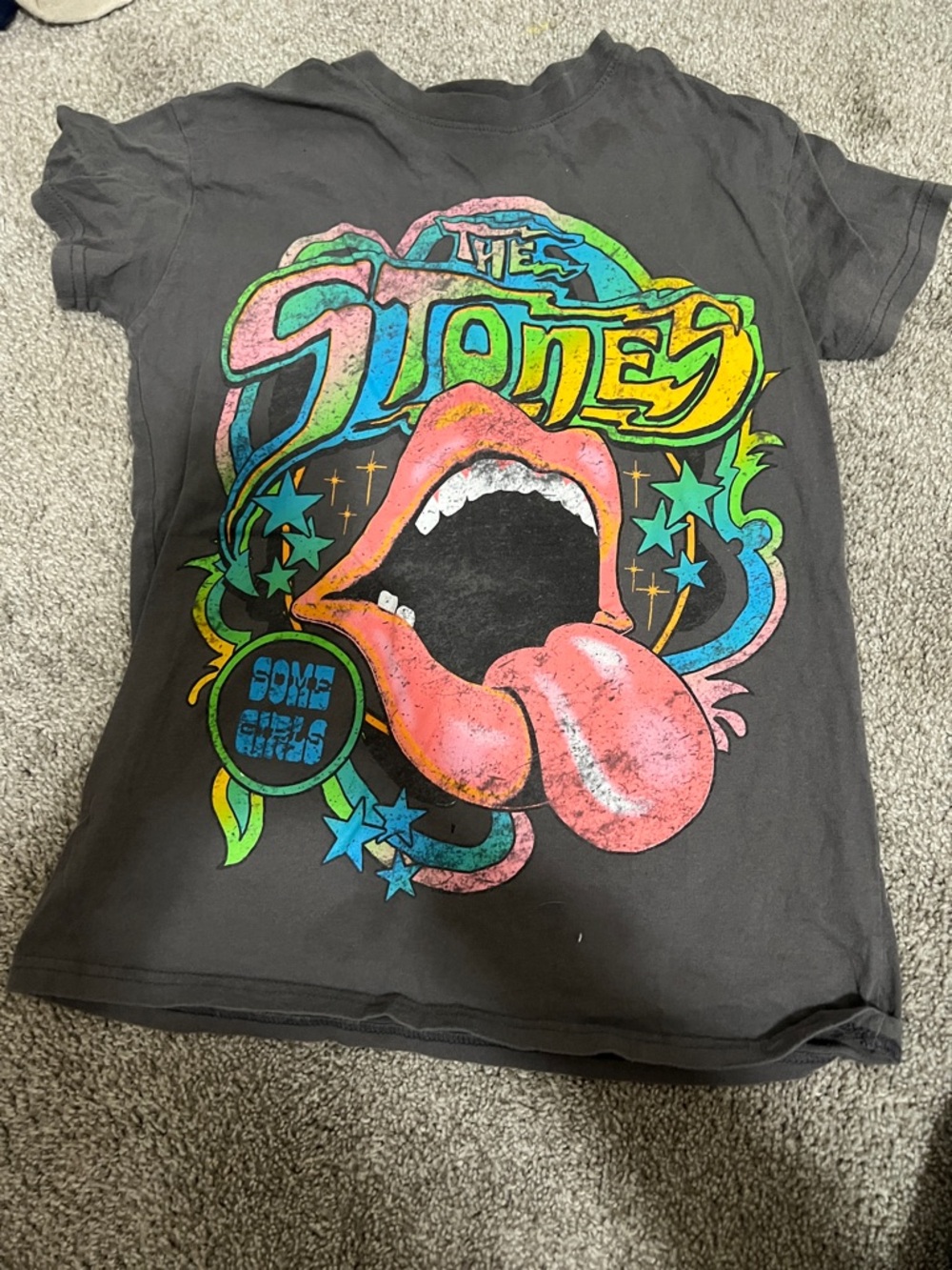 the Rolling Stones Black Tee with Pink, Yellow and Blue Tongue Graphic